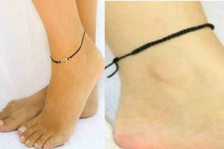 Benefits of wearing black thread on hand or foot.